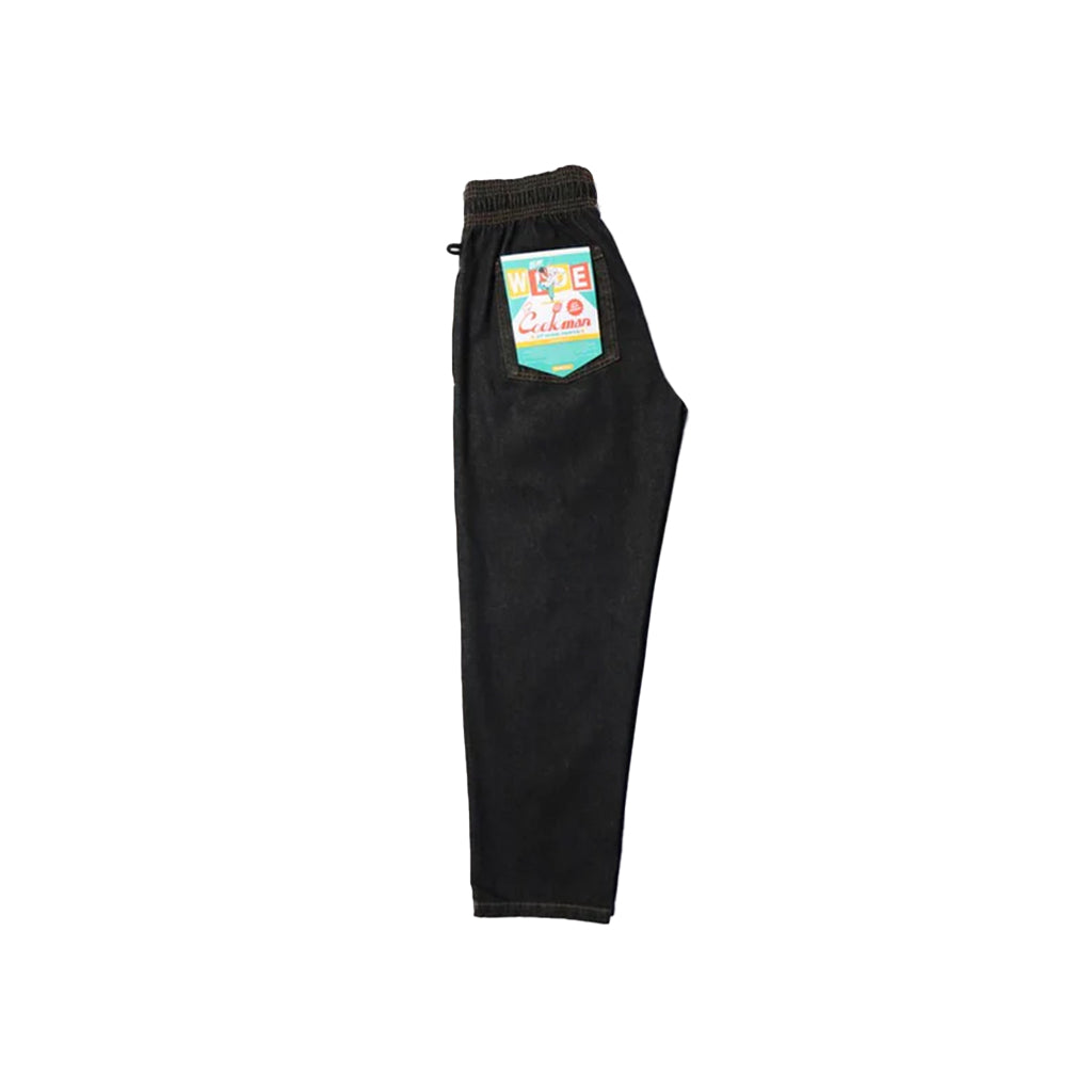 Black pants with a colorful label on a white background