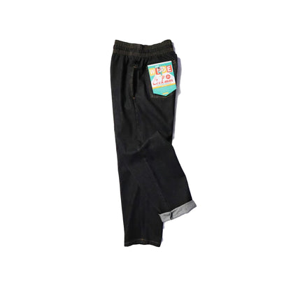 Black pants with a tag on a white background