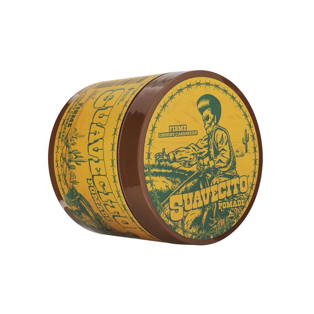 Suavecito pomade container with yellow label and brown rim on a white background