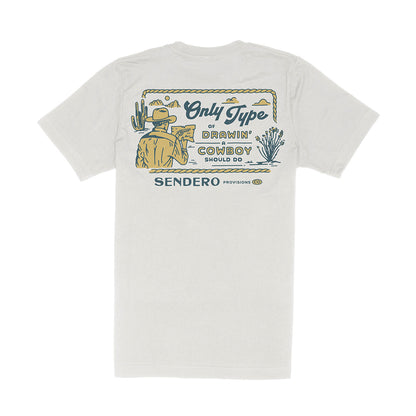 White t-shirt with a graphic design on the back featuring a cowboy and desert landscape, with 'Sendero' branding.