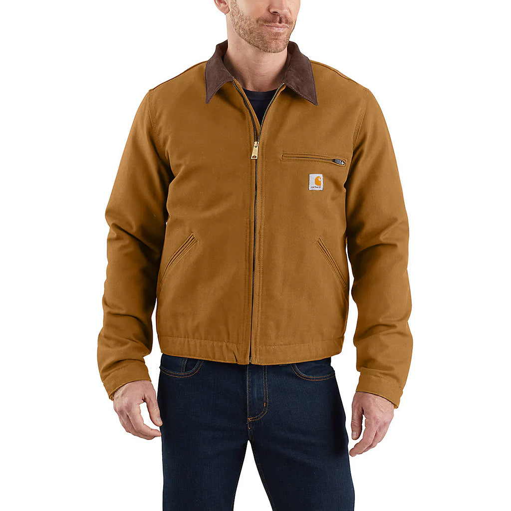 Man wearing a brown jacket with a visible brand logo on a white background