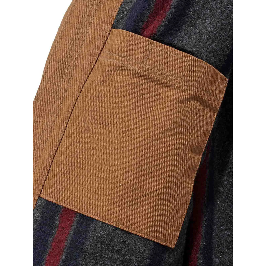 Close-up of a brown pocket on a plaid fabric background