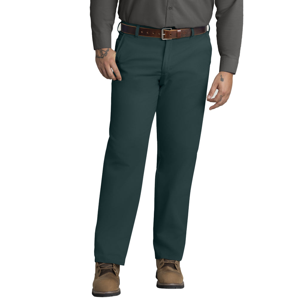 Dark green pants worn by a person on a white background