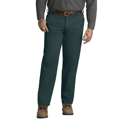 Dark green pants worn by a person on a white background