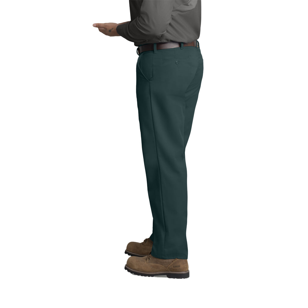 Person wearing green pants and brown shoes on a white background