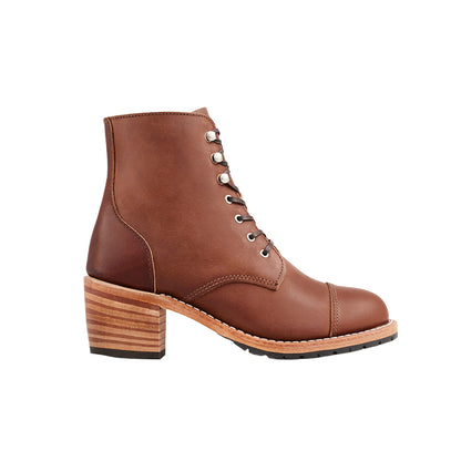 Brown leather boot with wooden block heel on a white background