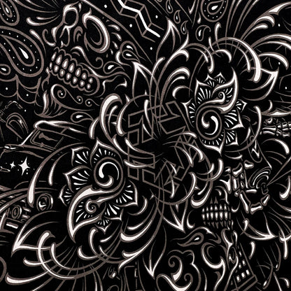 Black and white intricate skull design on a black background