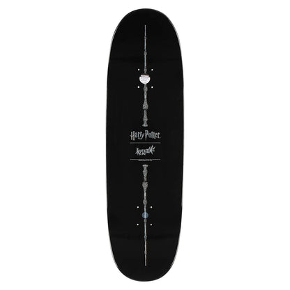 Black skateboard deck with silver designs and 'Harry Potter' branding on a white background