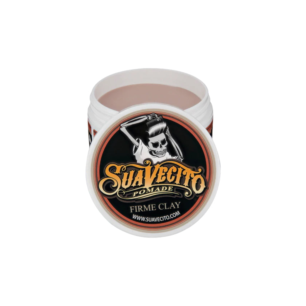 Jar of Suavecito pomade with a skull logo on a white background