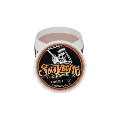 Jar of Suavecito pomade with a skull logo on a white background