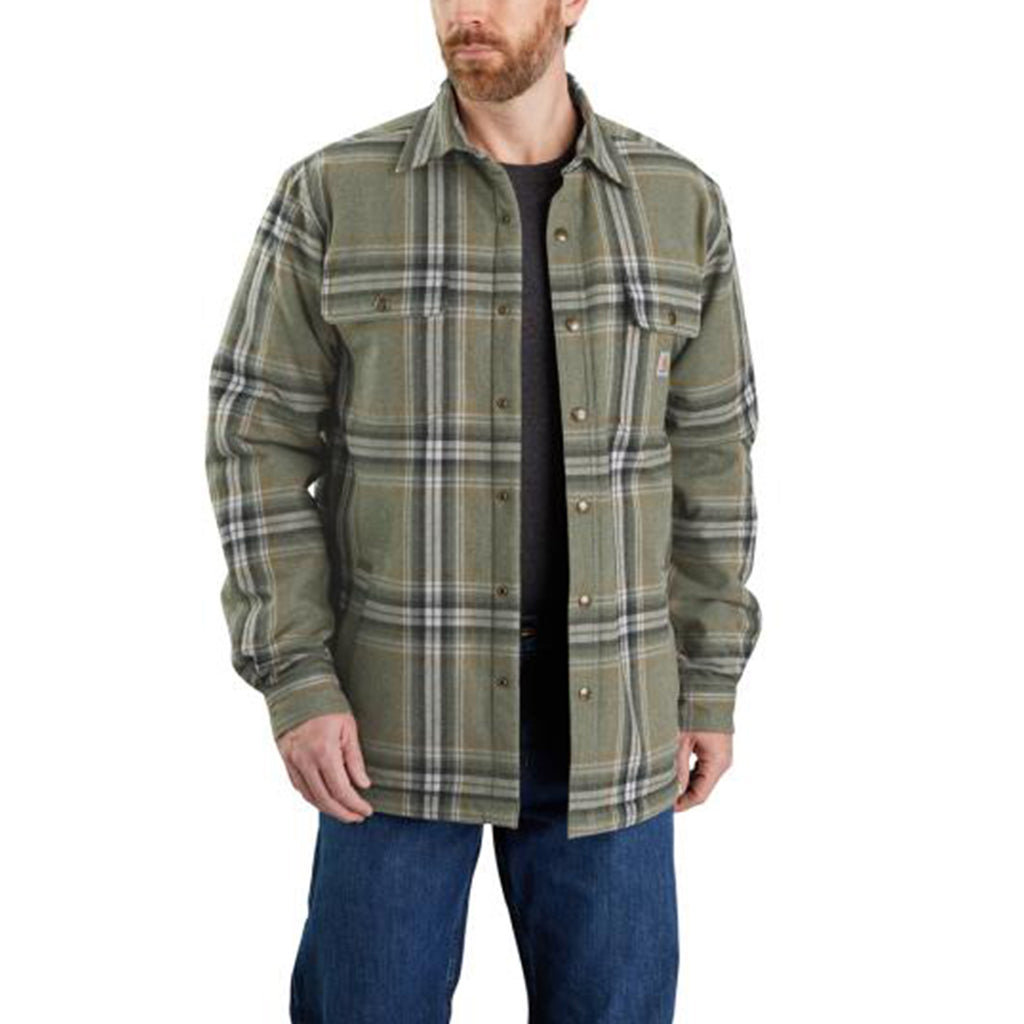 Man wearing a green plaid shirt on a white background