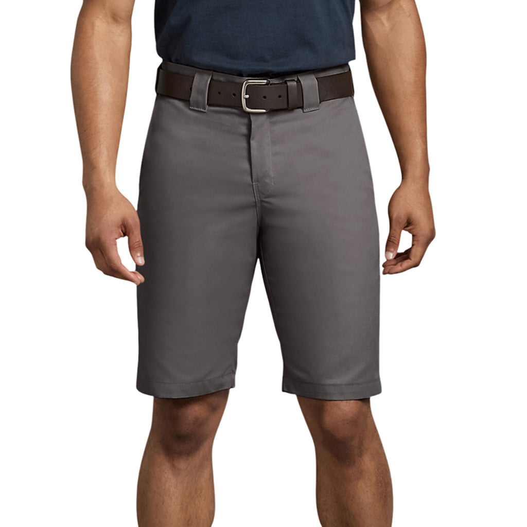 Person wearing gray shorts with a brown belt on a white background