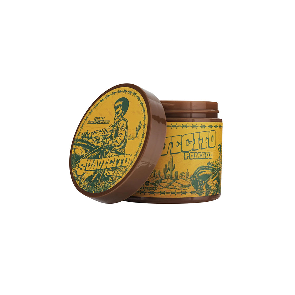 Jar of Suavecito Pomade with a cowboy illustration on a white background