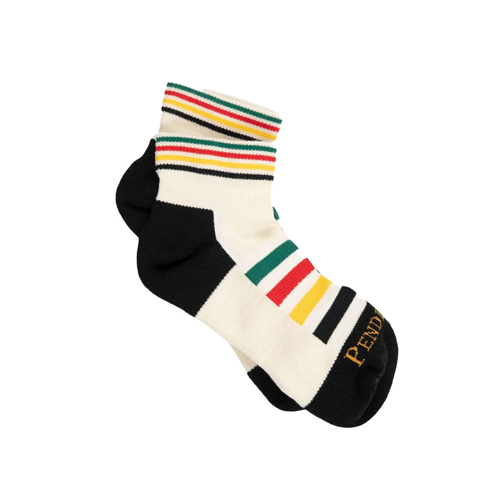 White sock with colorful stripes and black accents on a white background