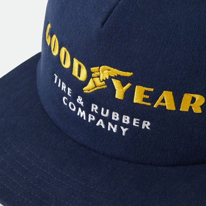 Navy blue cap with yellow and white embroidered text and logo on a white background