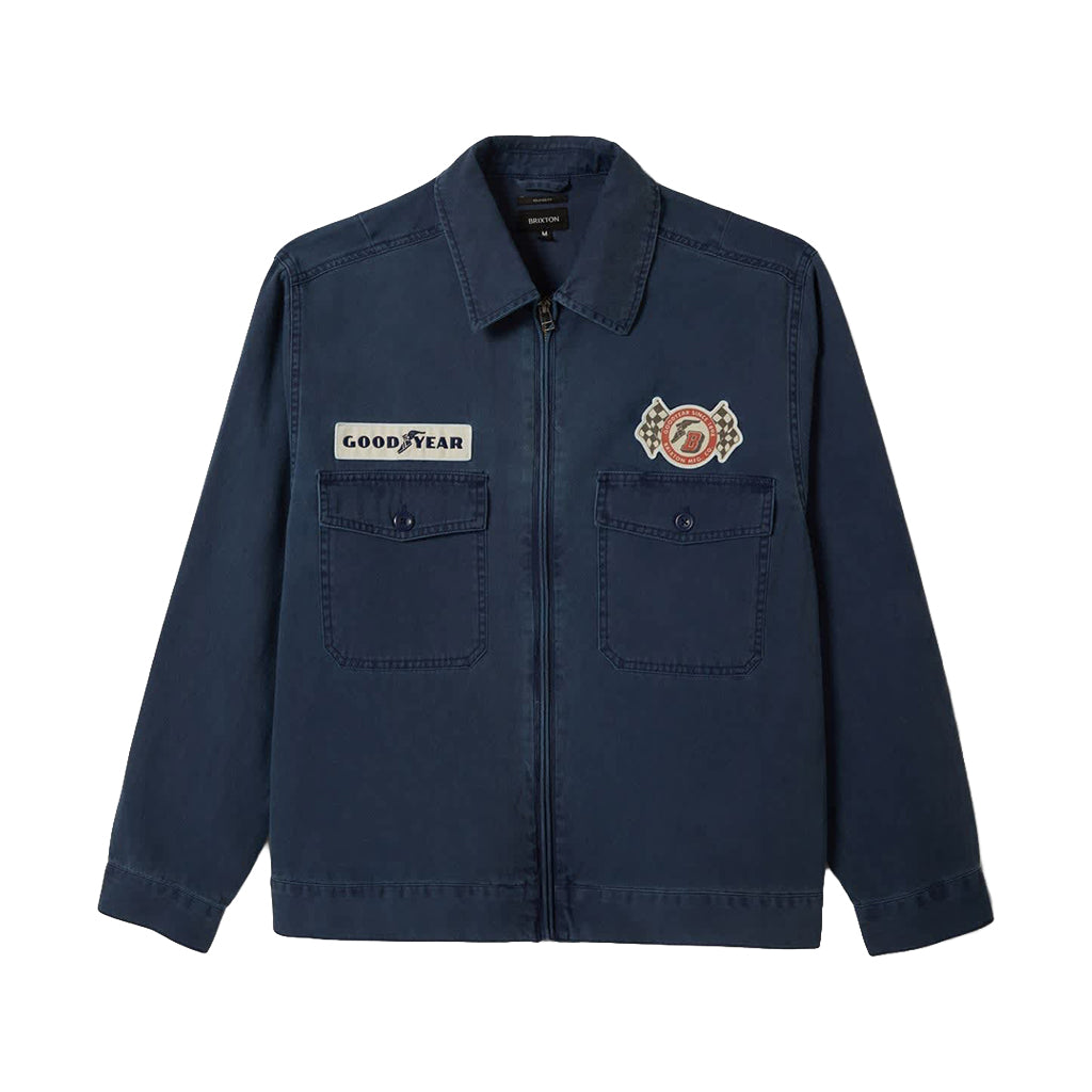 Navy blue jacket with 'Goodyear' logo on a white background