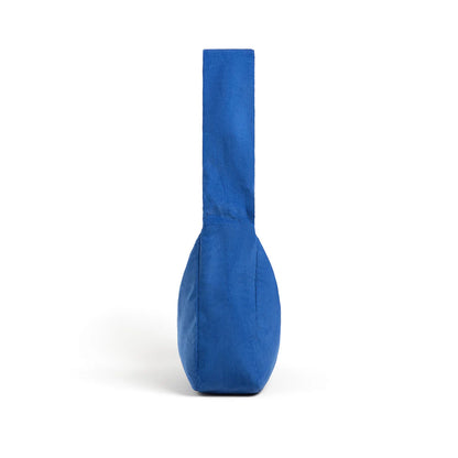 Blue fabric-covered object on a white background