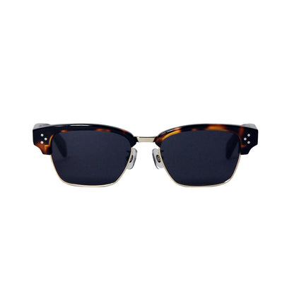 Sunglasses with tortoiseshell frame and dark lenses on a white background
