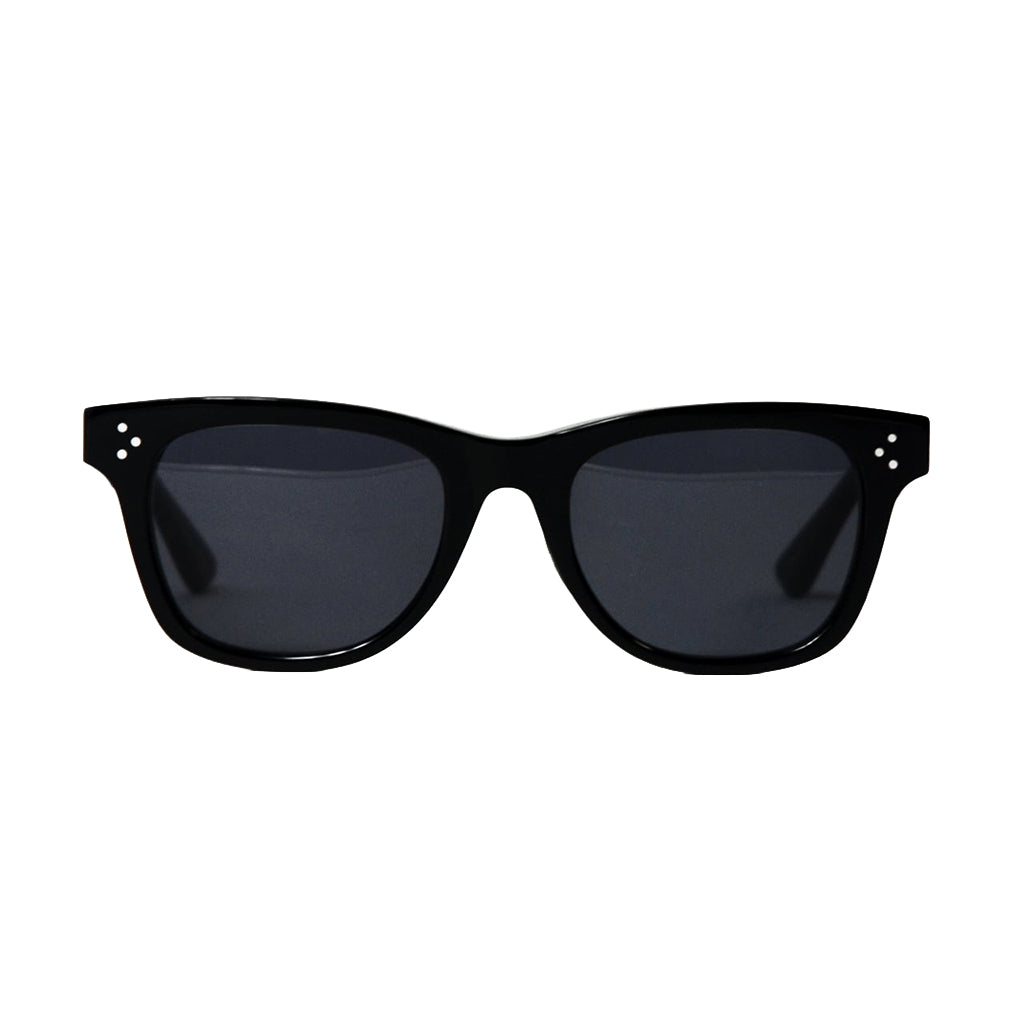 Black sunglasses with dark lenses on a white background