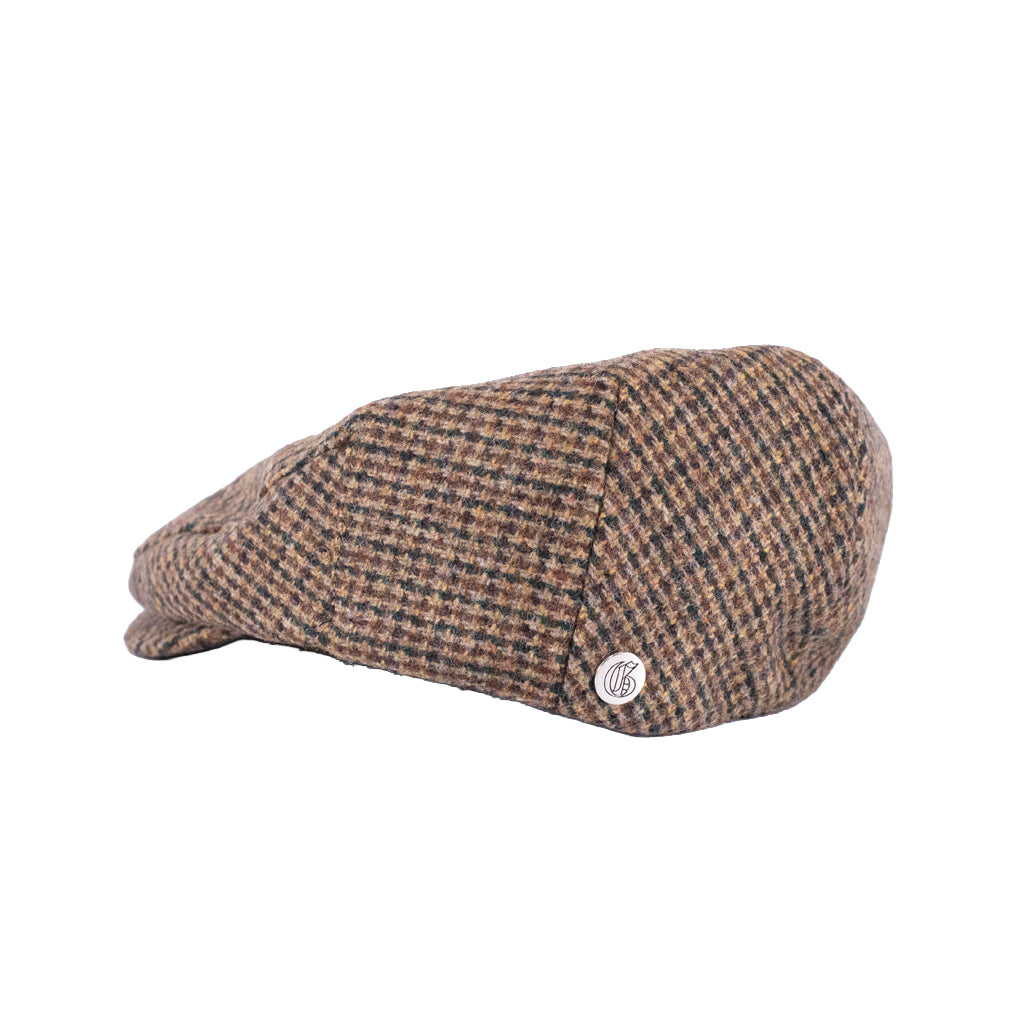 Houndstooth pattern cap with a logo on a white background