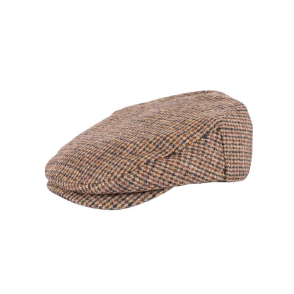Harris Tweed flat cap on a white background