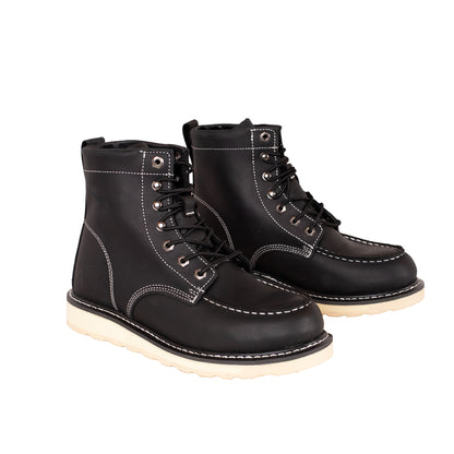 Pair of black leather boots with white soles on a white background