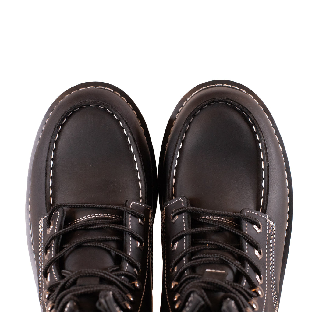Pair of brown leather boots on a white background