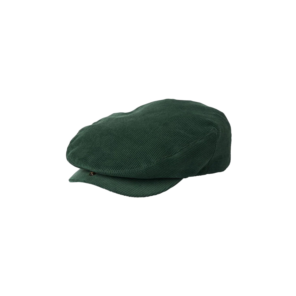 Green flat cap on a white background