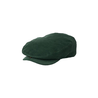 Green flat cap on a white background