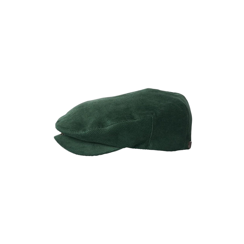Green corduroy cap on a white background