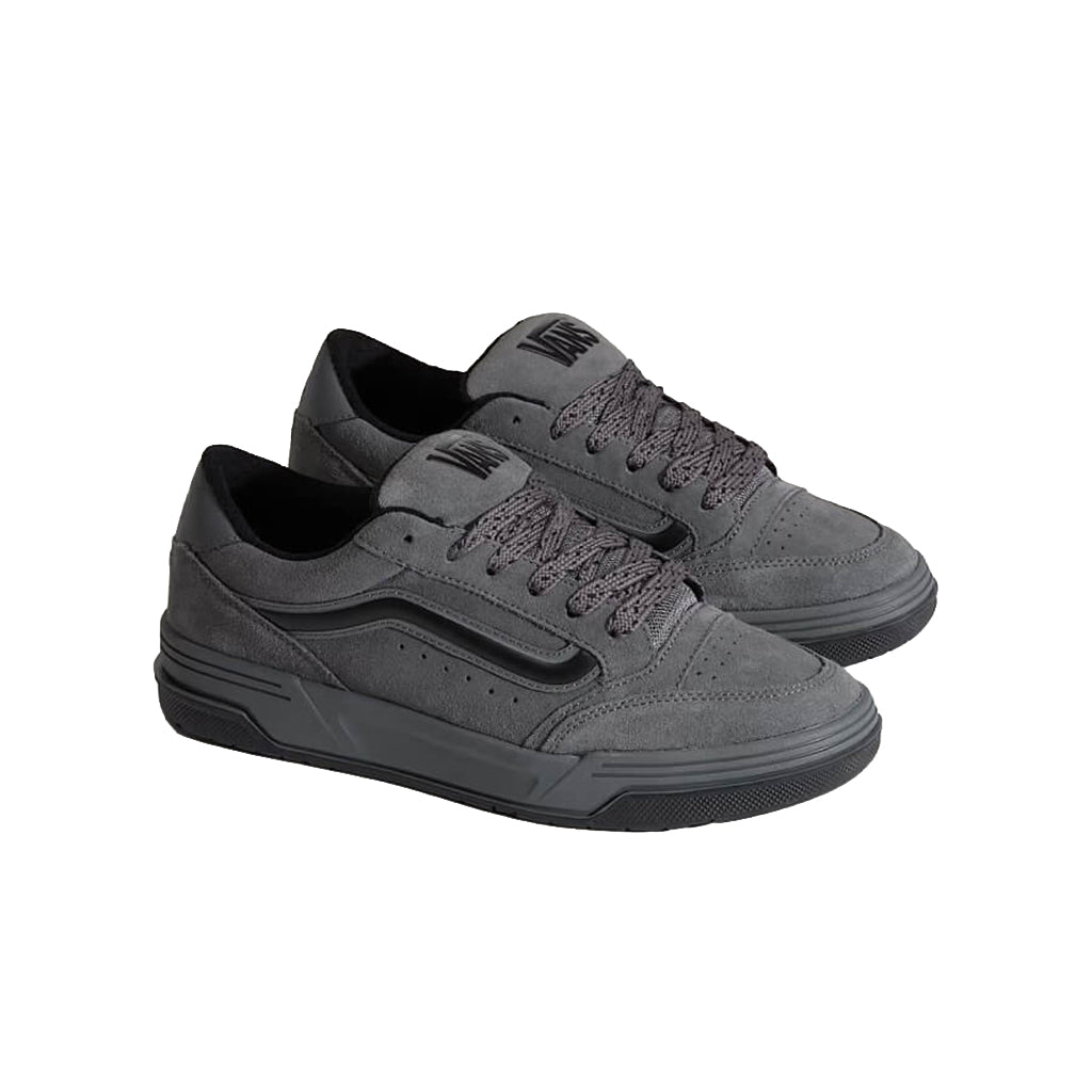 Gray sneakers with black accents on a white background