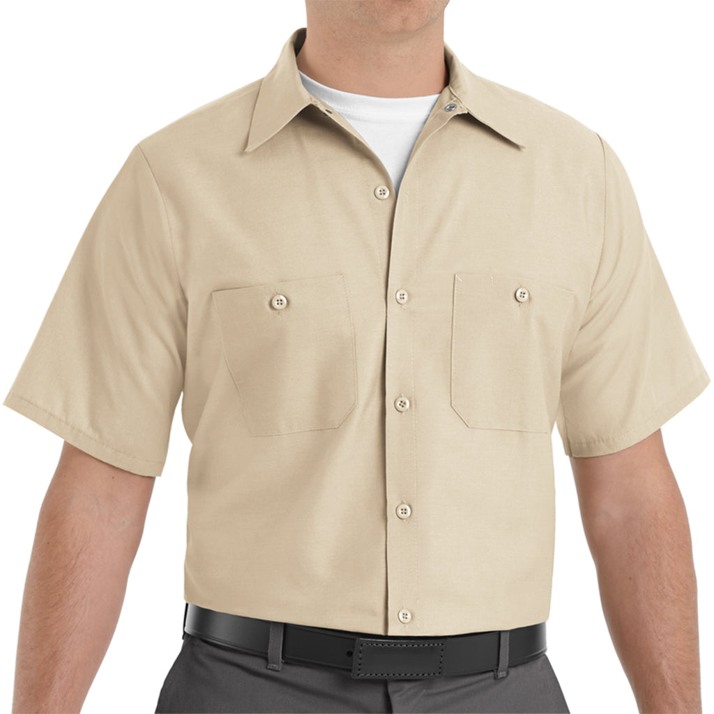 Beige short-sleeve shirt worn by a person on a white background