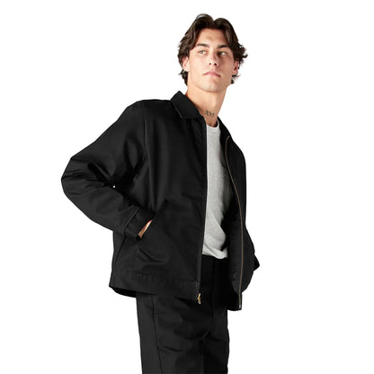 Man wearing a black jacket and pants on a white background