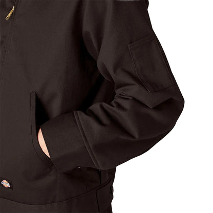 Close-up of a black jacket with a Dickies logo on a white background