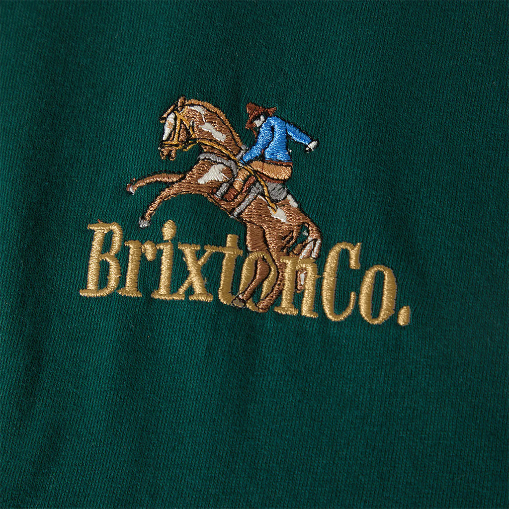 Embroidered logo of a person on a horse with 'Brixton Co.' text on a green background