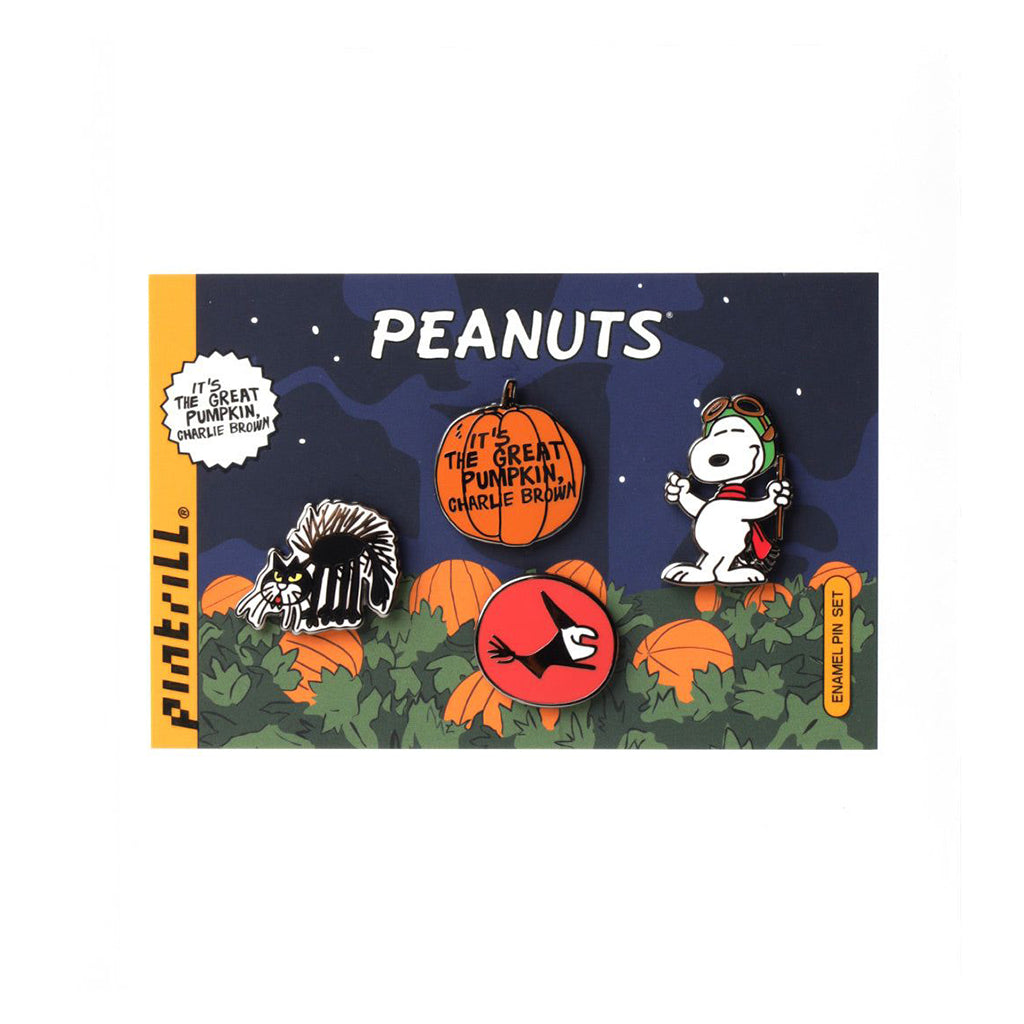 Peanuts-themed Halloween pins on a display card with 'It's Great Pumpkin Charlie Brown' text.