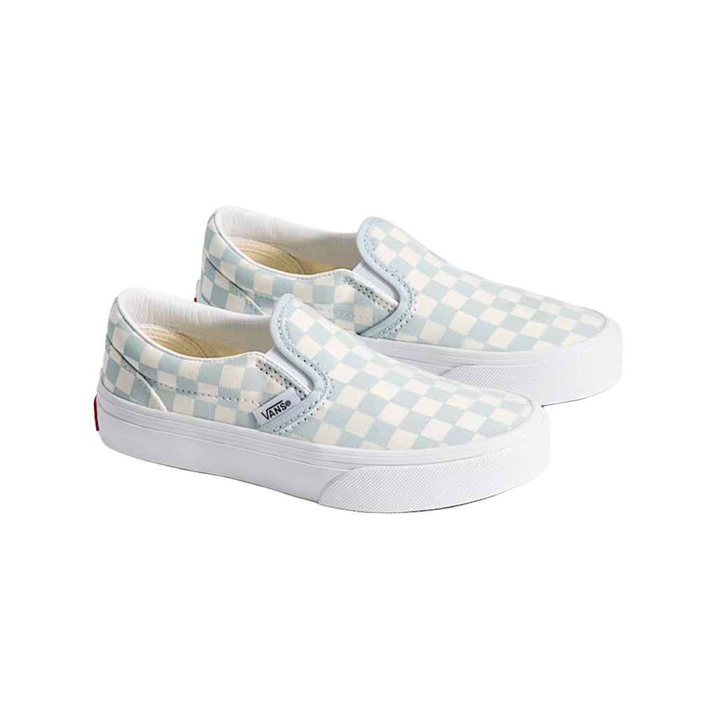 Pair of checkered slip-on shoes on a white background