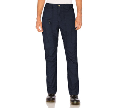 Navy pants worn by a person on a white background