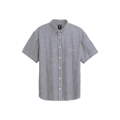 Striped short-sleeve shirt on a light gray background