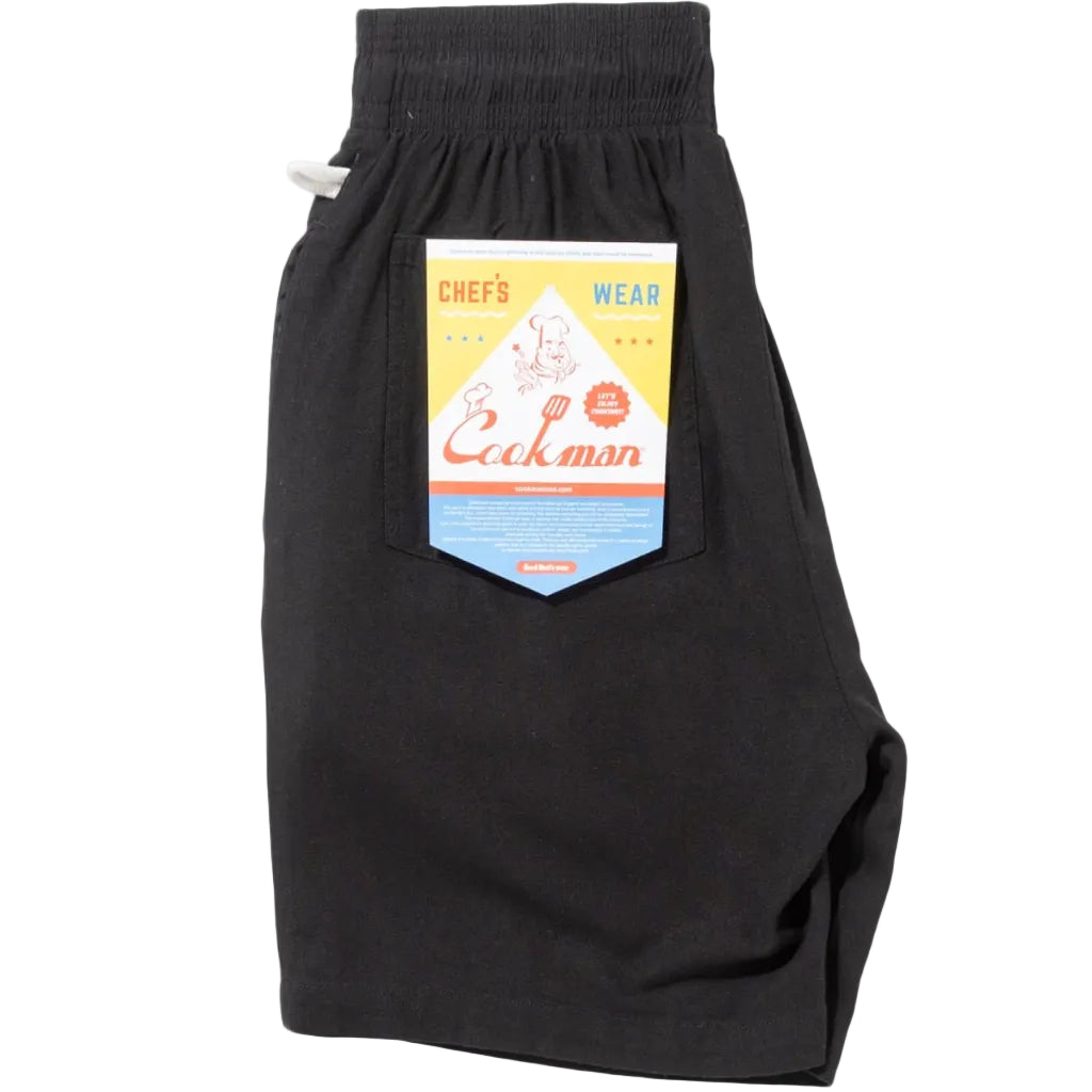 Black short with a visible brand label on a white background