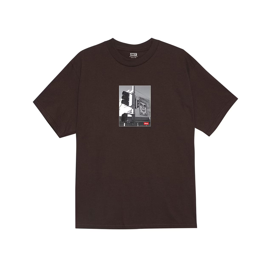 Brown t-shirt with a graphic design on a white background