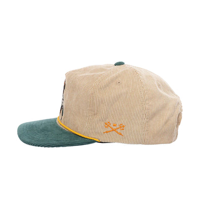 Beige and green cap with a logo on a white background