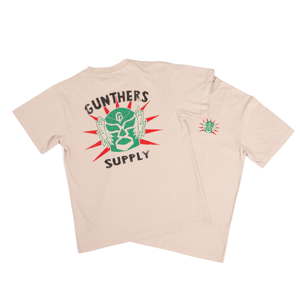 Beige t-shirt with 'Gunthers Supply' graphic on a white background