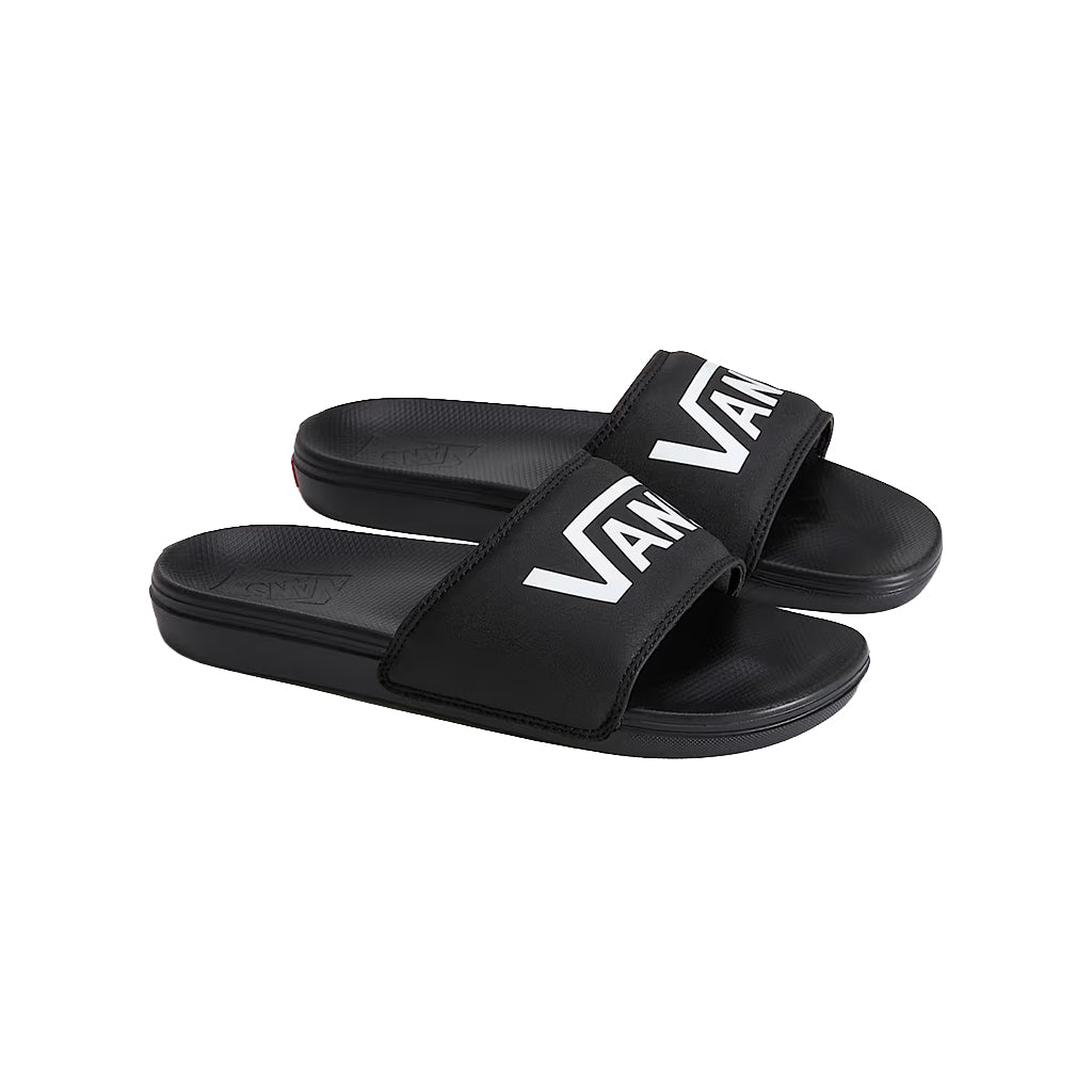 All black slides with Vans in white text on a white background