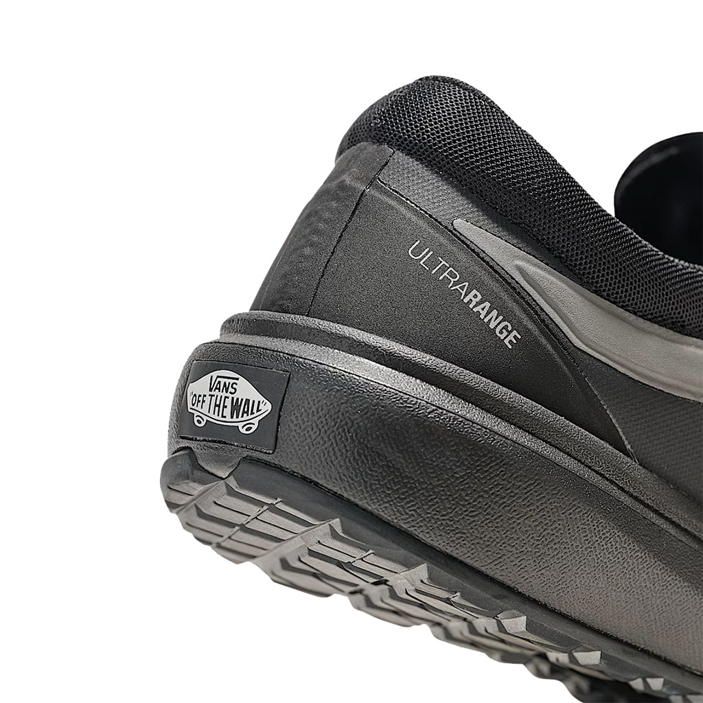 Black and grey athletic vans shoes showing the heel