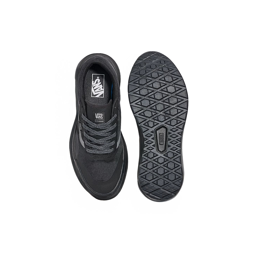 Black sneaker with sole view on a white background