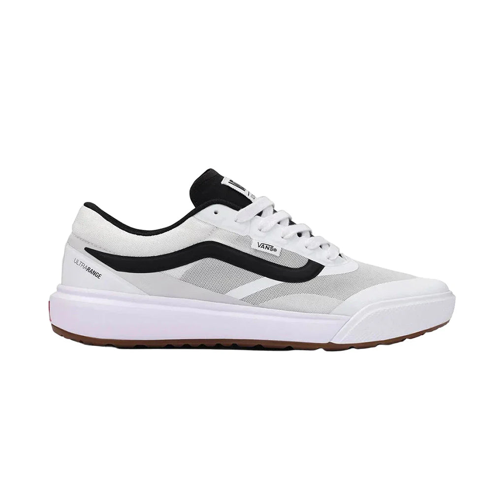 White and black sneaker with brown sole on a white background