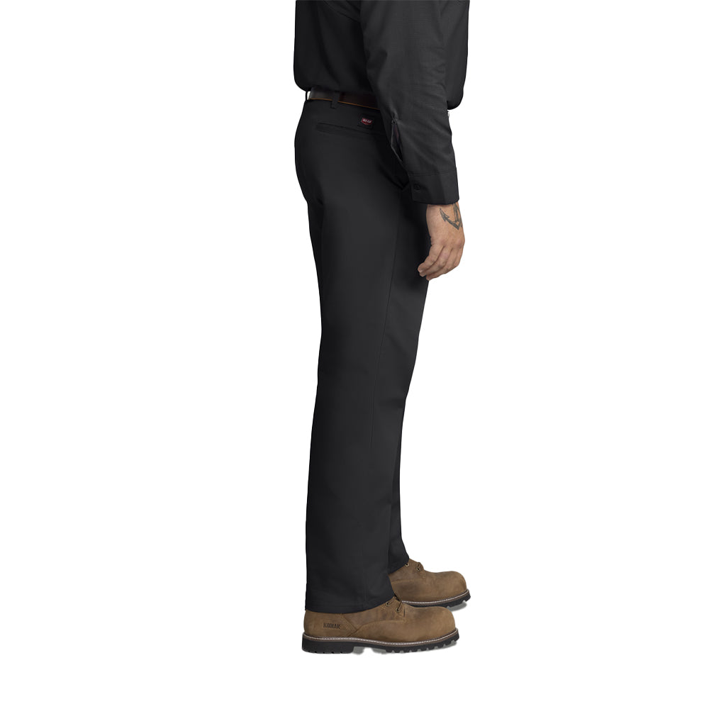 Person wearing black pants and brown shoes on a white background