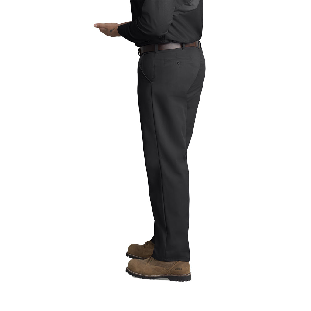 Person wearing dark gray pants and brown boots on a white background
