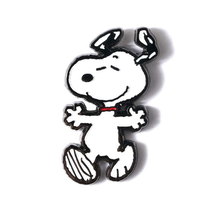 Snoopy figurine pin on a white background